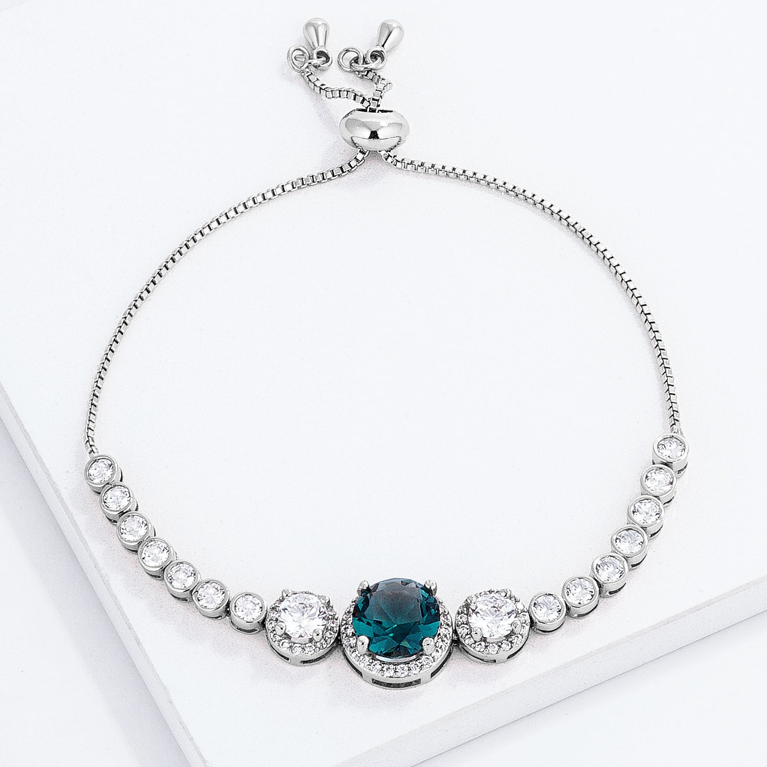 Adjustable Rhodium Plated Graduated CZ Bolo Style Tennis Bracelet