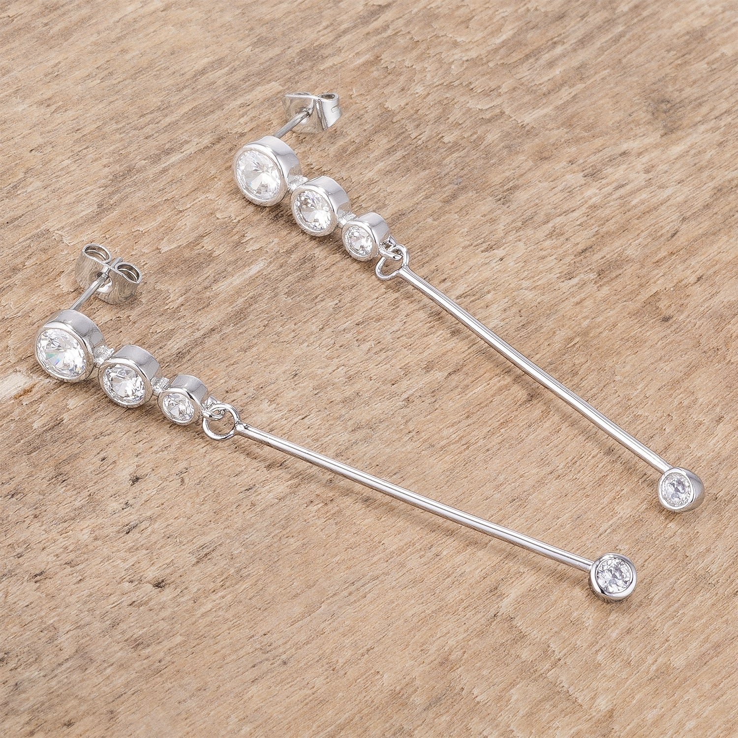 1.2Ct Graduated Rhodium Plated Drop Cubic Zirconia Earrings.